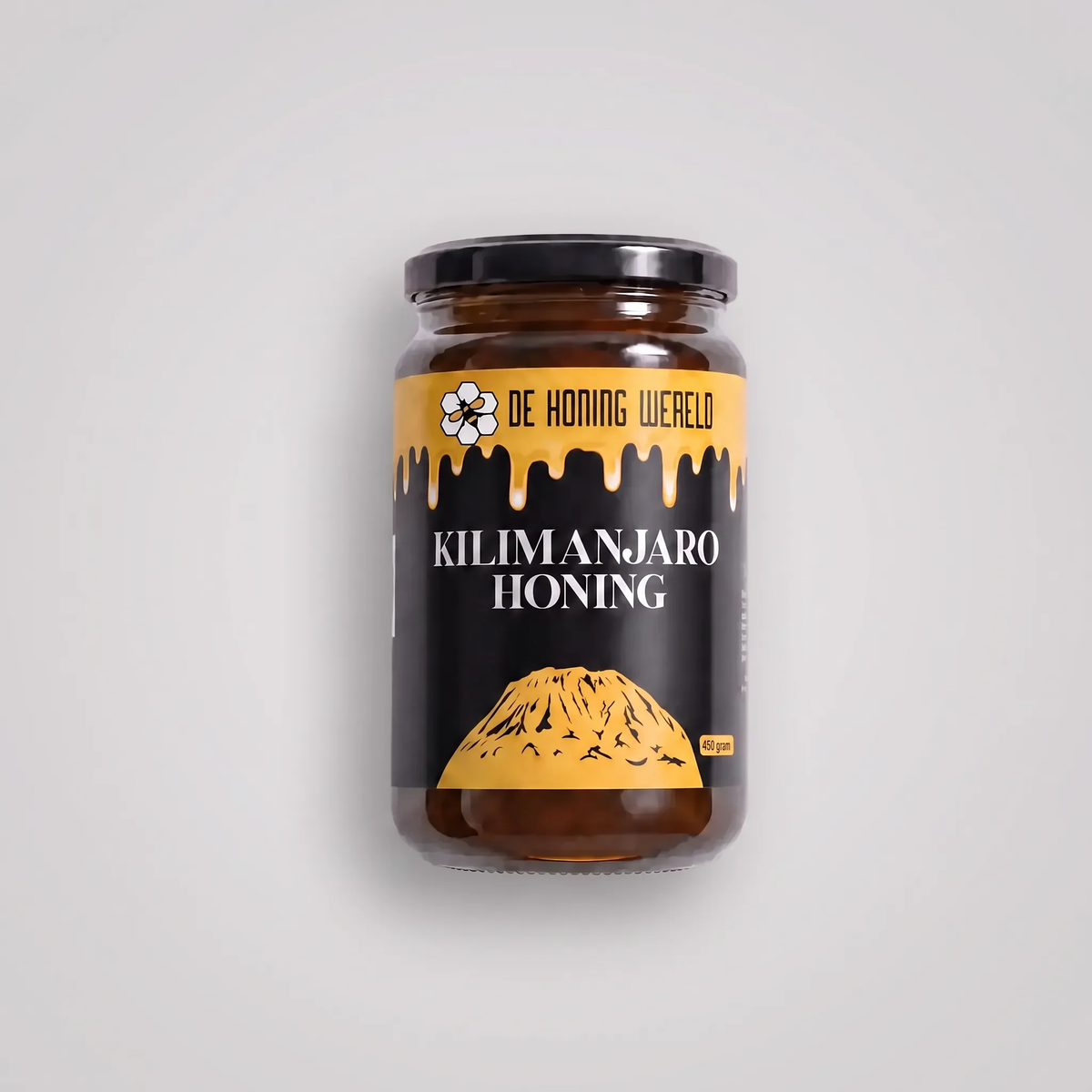 Pot Kilimanjaro-honing van De Honing Wereld liggend gefotografeerd